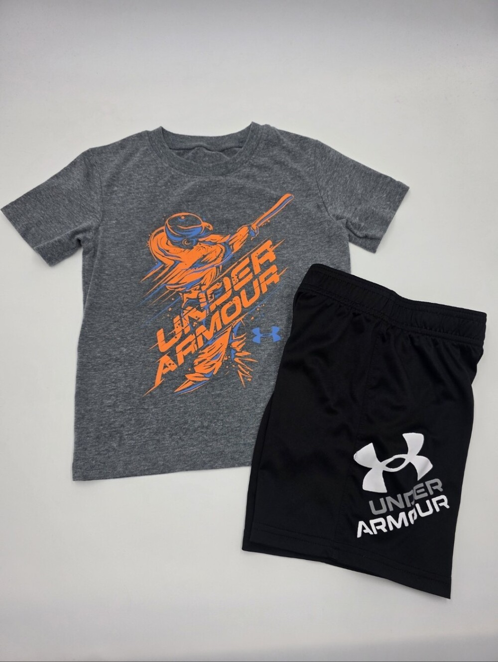 Under Armour boys' baseball tee and black athletic shorts size 4